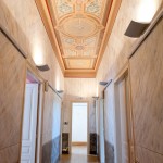 The second floor corridor is also features restored hand painted walls and ceilings